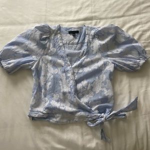 Banana republic blue and white top. Ties at the bottom.